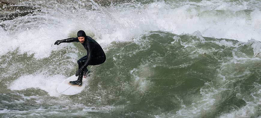 Why Wear a Wetsuit While Surfing?